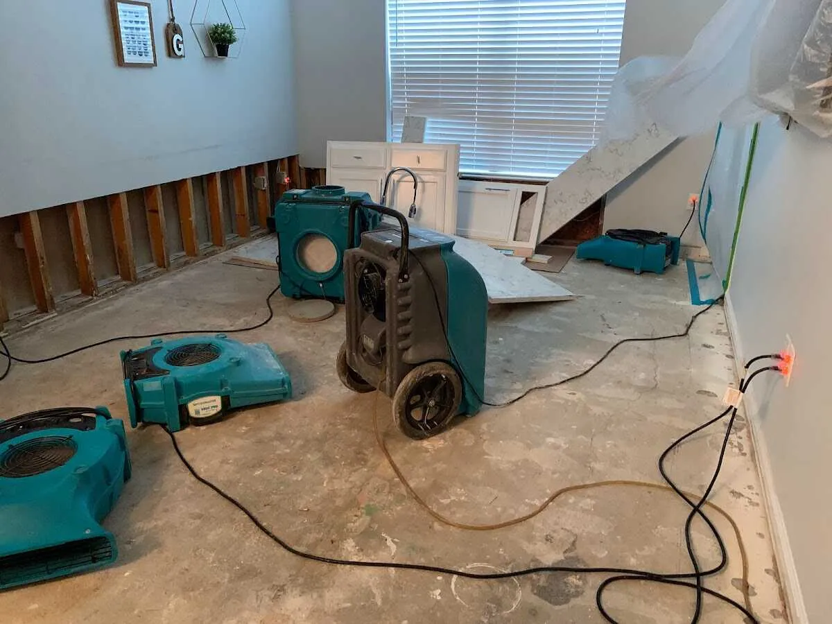 Dehumidifier in flood-cut room for Water Damage Restoration in Willoughby